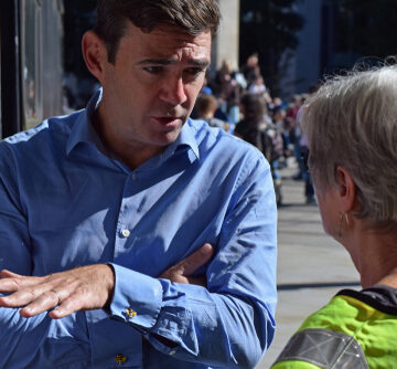Labour Party MP Andy Burnham, who has served as the Mayor of Greater Manchester since 2017, speaking with a constituent. Labour Party MP Andy Burnham, who has served as the Mayor of Greater Manchester since 2017, speaking with a constituent.