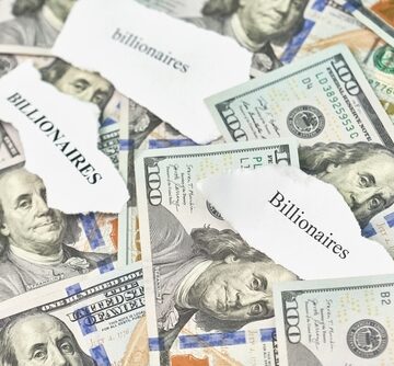 Concept image of a scattered pile of United States $100 bills overlaid with torn scraps of white paper bearing the word "billionaires". Concept image of a scattered pile of United States $100 bills overlaid with torn scraps of white paper bearing the word "billionaires".