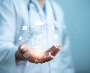 A medical professional holding a holographic display showcasing various digital health icons like a brain, heart, and cloud. A medical professional holding a holographic display showcasing various digital health icons like a brain, heart, and cloud.