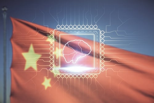 Double exposure representing artificial intelligence advancements within China, featuring a brain-shaped hologram overlaid on a microchip circuit.