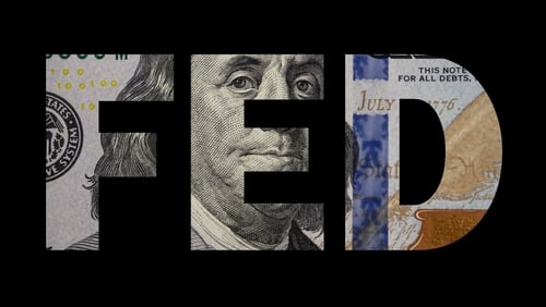 The word "FED" superimposed over a United States $100 bill, which prominently displays a portrait of Benjamin Franklin. The word "FED" superimposed over a United States $100 bill, which prominently displays a portrait of Benjamin Franklin.