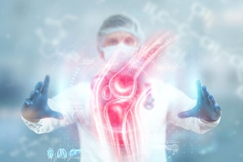 Joint,Pain,,The,Doctor,Looks,At,The,Hologram,Of,The NEW TREATMENT MAY BE THE FIRST CURE FOR OSTEOARTHRITIS