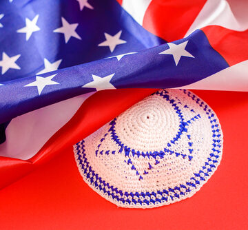 Jewish,Kipa,Under,An,American,Flag,,Isolated,On,Red,Background AMERICAN JEWS ARE DIVIDED WHEN IT COMES TO ISRAEL: POLL