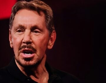 Larry Ellison, the co-founder and chairman of Oracle Corporation, giving a speech at a conference. Larry Ellison, the co-founder and chairman of Oracle Corporation, giving a speech at a conference.
