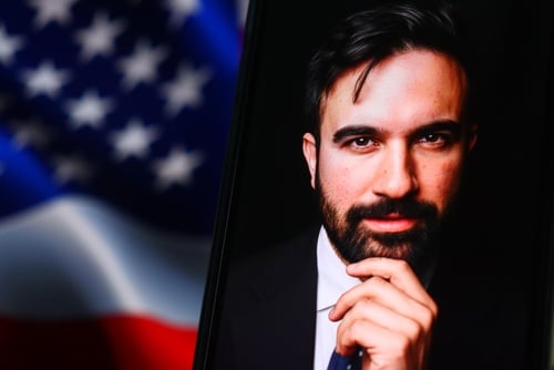 Zohran Mamdani, currently serving as the 112th Mayor of New York City, with an American flag in the background. Zohran Mamdani, currently serving as the 112th Mayor of New York City, with an American flag in the background.
