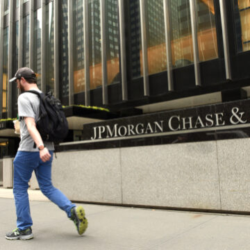 A man walks past the JPMorgan Chase & Co. office building located on Park Avenue in New York City. A man walks past the JPMorgan Chase & Co. office building located on Park Avenue in New York City.