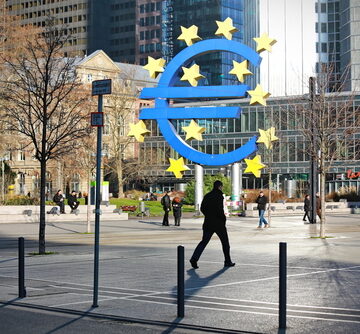 The famous Euro-Skulptur (Euro Sculpture) located at Willy-Brandt-Platz in Frankfurt am Main, Germany, standing in front of the Eurotower, the former headquarters of the European Central Bank. The famous Euro-Skulptur (Euro Sculpture) located at Willy-Brandt-Platz in Frankfurt am Main, Germany, standing in front of the Eurotower, the former headquarters of the European Central Bank.