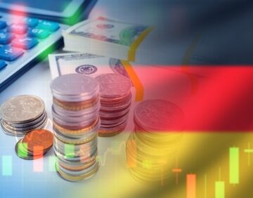 Concept representation of the German economy, overlaying financial charts, currency, and a calculator with the German national flag. Concept representation of the German economy, overlaying financial charts, currency, and a calculator with the German national flag.