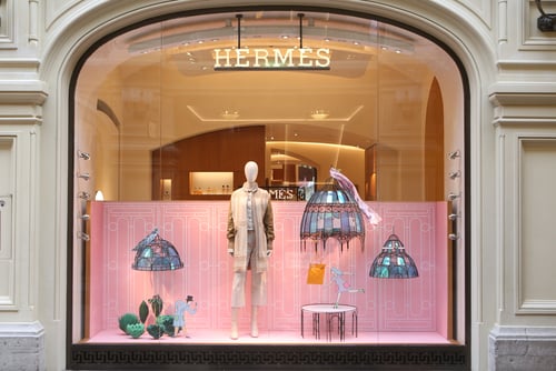 The Hermès boutique window display in the GUM department store in Moscow, featuring whimsical sculpted lighting and textured walls. The Hermès boutique window display in the GUM department store in Moscow, featuring whimsical sculpted lighting and textured walls.