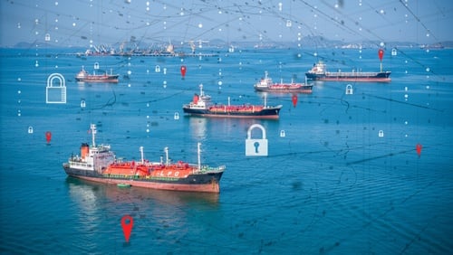 Multiple cargo ships and oil tankers navigating open waters, overlaid with a digital graphic network of padlocks and geographic location pins. Multiple cargo ships and oil tankers navigating open waters, overlaid with a digital graphic network of padlocks and geographic location pins.