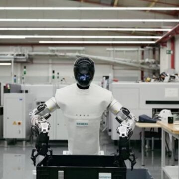 A Neura robot shifts crates in a Siemens factory. Photo: Siemens