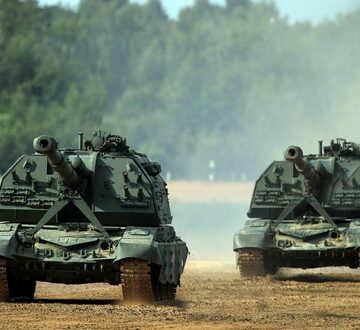 Two 2S19 Msta-S 152mm self-propelled howitzers, a type of armored artillery that was developed by the Soviet Union and entered service in 1989. Two 2S19 Msta-S 152mm self-propelled howitzers, a type of armored artillery that was developed by the Soviet Union and entered service in 1989.