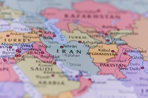 A close-up of a political map focusing on Western and Central Asia, with Iran centered prominently in light green, bordered by countries like Iraq, Turkey, Turkmenistan, Afghanistan, and Pakistan. A close-up of a political map focusing on Western and Central Asia, with Iran centered prominently in light green, bordered by countries like Iraq, Turkey, Turkmenistan, Afghanistan, and Pakistan.