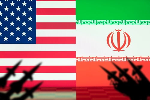 Flags,Of,The,United,States,And,Iran,With,Missile,Launchers TRUMP SAYS ADMINISTRATION IS ‘LOW-KEYING’ IRAN APPROACH