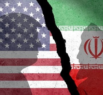 The U.S. and Iranian flags separated by a jagged crack with the silhouettes of Donald Trump and Mojtaba Khamenei against their respective flags. The U.S. and Iranian flags separated by a jagged crack with the silhouettes of Donald Trump and Mojtaba Khamenei against their respective flags.