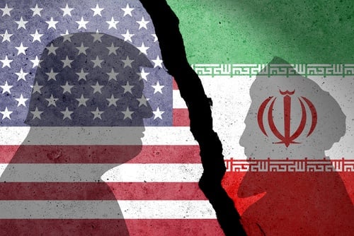 The U.S. and Iranian flags separated by a jagged crack with the silhouettes of Donald Trump and Mojtaba Khamenei against their respective flags. The U.S. and Iranian flags separated by a jagged crack with the silhouettes of Donald Trump and Mojtaba Khamenei against their respective flags.