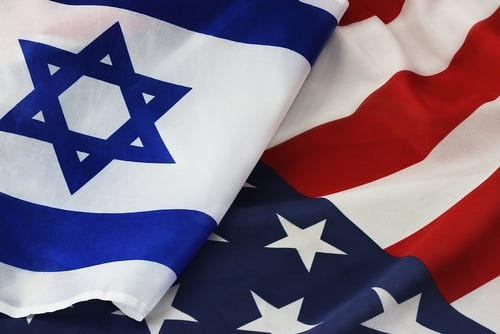 The national flag of Israel draped alongside the national flag of the U.S., symbolizing their long-standing strategic alliance. The national flag of Israel draped alongside the national flag of the U.S., symbolizing their long-standing strategic alliance.