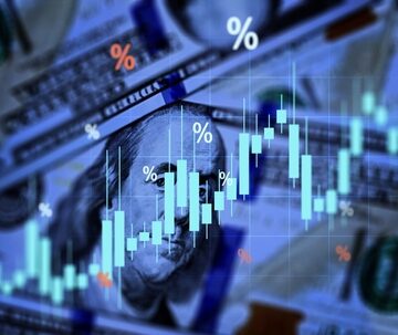 A digital financial graphic overlaid on U.S. dollar banknotes, illustrating macroeconomic concepts such as currency valuation, interest rates, and market trends. A digital financial graphic overlaid on U.S. dollar banknotes, illustrating macroeconomic concepts such as currency valuation, interest rates, and market trends.