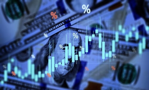 A digital financial graphic overlaid on U.S. dollar banknotes, illustrating macroeconomic concepts such as currency valuation, interest rates, and market trends. A digital financial graphic overlaid on U.S. dollar banknotes, illustrating macroeconomic concepts such as currency valuation, interest rates, and market trends.