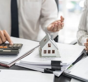 Business,People,Signing,Contract,Making,Deal,With,Real,Estate,Agent NEW STUDY FOUND THAT FEDERAL SPENDING DID NOTHING TO MAKE HOMES MORE AFFORDABLE