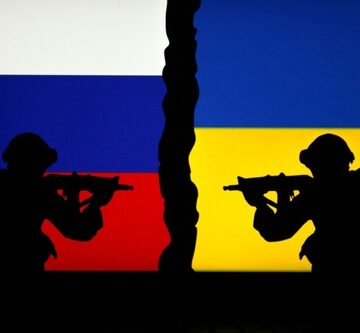 Russia,Vs,Ukraine.,Silhouette,Of,Soldiers,With,Russia,And,Ukraine RUSSIA LAUNCHES NEW ATTACKS ON KYIV AS ZELENSKY SAYS NOW IS NOT THE TIME FOR ELECTIONS