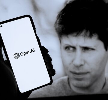 Brooklyn,,Ny,,Usa,,11.22.20:,Sam,Altman,And,The,Openai,Logo ALTMAN SAYS OPENAI IS OPEN TO SLOWING AI DEVELOPMENT