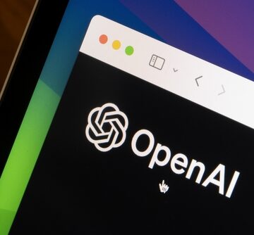 An image of the OpenAI logo displayed on a mobile phone screen. An image of the OpenAI logo displayed on a mobile phone screen.