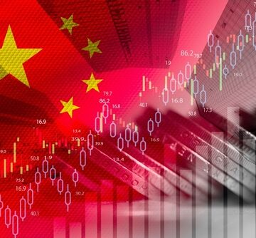 Concept image of China's stock market performance and economic trends showing coins, graphs, and the flag of China. Concept image of China's stock market performance and economic trends showing coins, graphs, and the flag of China.