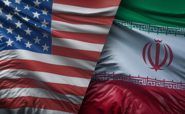 Overlapping and in shadow, the image of the national flags of the United States and Iran represent the long-standing and complex diplomatic, political, and strategic relations between the two nations. Overlapping and in shadow, the image of the national flags of the United States and Iran represent the long-standing and complex diplomatic, political, and strategic relations between the two nations.