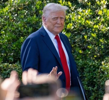 President Donald Trump gesturing toward reporters on the South Lawn of the White House. President Donald Trump gesturing toward reporters on the South Lawn of the White House.