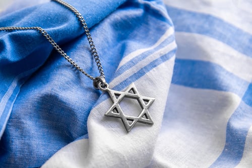 Star,Of,David,("magen,David"),Chain,On,White-blue,Fabric. JEWS IN THE U.S. TAKE A NEW LOOK AT WHAT IT MEANS TO BE A ZIONIST