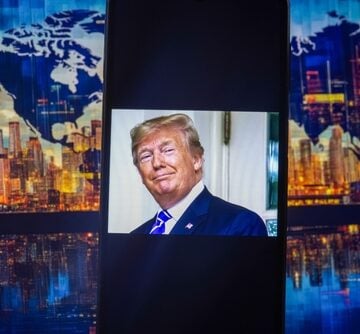 A,Smartphone,Screen,Displaying,A,Photo,Of,President,Donald,Trump, TRUMP LIES, TELLS AMERICANS PRICES ARE FALLING