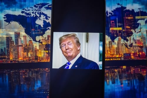 A,Smartphone,Screen,Displaying,A,Photo,Of,President,Donald,Trump, TRUMP LIES, TELLS AMERICANS PRICES ARE FALLING