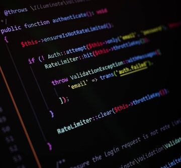 A close-up of a PHP code snippet handling user authentication, rate limiting, and validation logic. A close-up of a PHP code snippet handling user authentication, rate limiting, and validation logic.