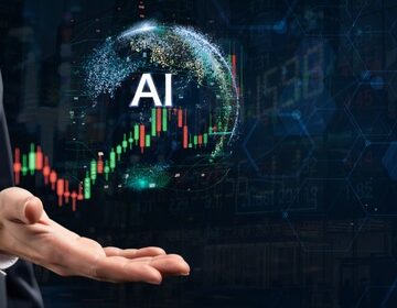 A digital overlay of a glowing sphere with an "AI" label, and a candlestick stock chart floating over a person's hand representing modern technology in trading and financial markets.