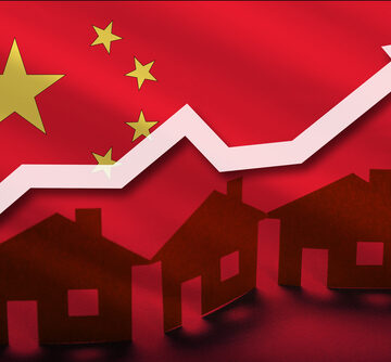Brown house silhouettes are lined up in the foreground with the flag of China in the background and a white upward trending arrow/line with an arrowhead across the entire image.