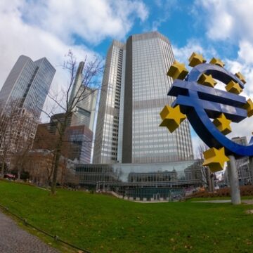 The iconic 14-meter-tall Euro-Skulptur (Euro sculpture) located at Willy-Brandt-Platz in Frankfurt, Germany, standing in front of the Eurotower, which served as the headquarters of the European Central Bank (ECB) from 1998 until 2014.