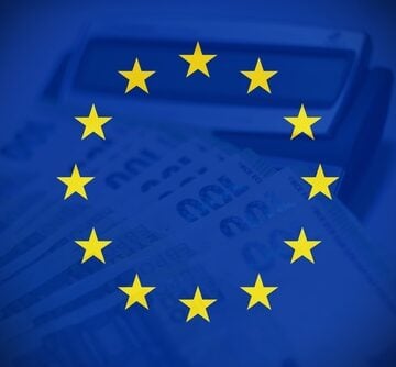 The image features the European Union flag overlaid on a calculator and financial notes. The image features the European Union flag overlaid on a calculator and financial notes.