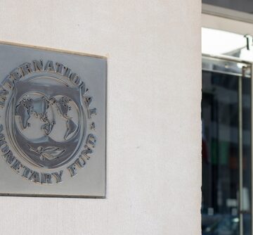 The official seal and entrance of Headquarters 2 (HQ2) of the International Monetary Fund (IMF), located at 1900 Pennsylvania Ave NW, Washington, D.C.