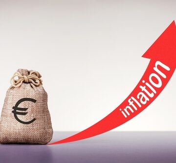 Financial concept representing rising euro inflation through a money bag marked with a euro symbol next to an upward-trending red arrow labeled "inflation." Financial concept representing rising euro inflation through a money bag marked with a euro symbol next to an upward-trending red arrow labeled "inflation."