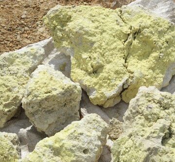 Raw native sulfur chunks with a bright yellow mineral texture.