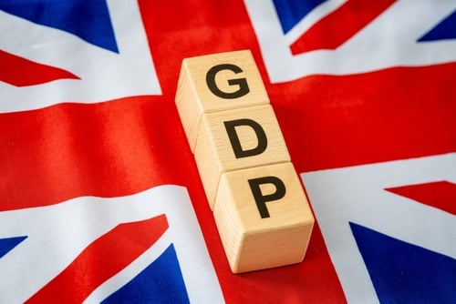 Wooden blocks spelling GDP (Gross Domestic Product) placed on top of a British Union Jack flag. Wooden blocks spelling GDP (Gross Domestic Product) placed on top of a British Union Jack flag.