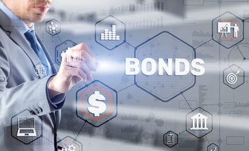 Concept image features a businessman interacting with a virtual digital interface of connected hexagonal icons centered around the word "BONDS".