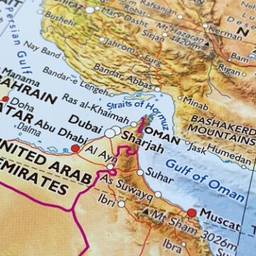 Image of an atlas map showing the Persian Gulf, the Strait of Hormuz, the Gulf of Oman, and surrounding countries in the Middle East, including the United Arab Emirates (UAE), Oman, Qatar, Bahrain, and southern Iran. Image of an atlas map showing the Persian Gulf, the Strait of Hormuz, the Gulf of Oman, and surrounding countries in the Middle East, including the United Arab Emirates (UAE), Oman, Qatar, Bahrain, and southern Iran.