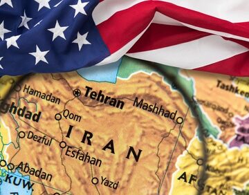 A conceptual map focusing on Iran overlaid with an American flag. A conceptual map focusing on Iran overlaid with an American flag.
