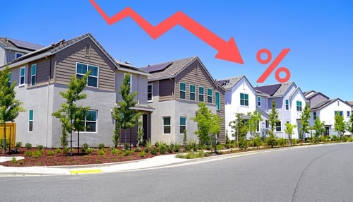 A row of modern suburban townhomes with a red downward arrow and a percentage symbol overlay. A row of modern suburban townhomes with a red downward arrow and a percentage symbol overlay.