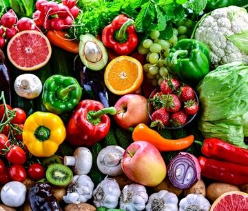 A colorful and fresh assortment of raw fruits and vegetables. A colorful and fresh assortment of raw fruits and vegetables.