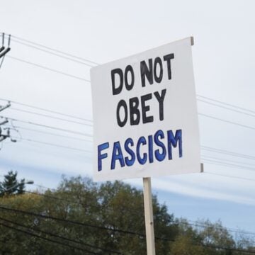 Rockville,,Md,Usa,-,October,18,,2025,:,Protest,Sign FASCISM: BIGGEST COMPANIES IN THE U.S. PAID LOWEST TAX BILL EVER